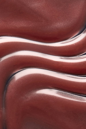 Close-up of Peptint lip treatment texture in Utopia mauve shade