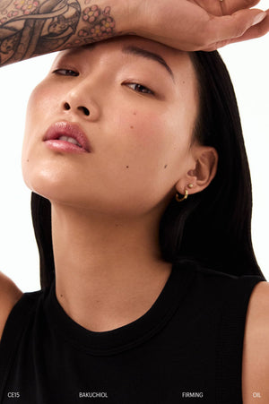 Close-up of glowing skin after using the Bakuchiol Firming Oil