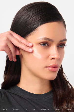 Model applying Multi Peptides & GF Advanced Lifting Serum to cheek
