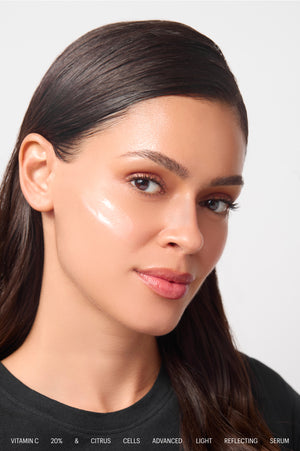 Model with Vitamin C 20% Serum applied to a glowing cheek